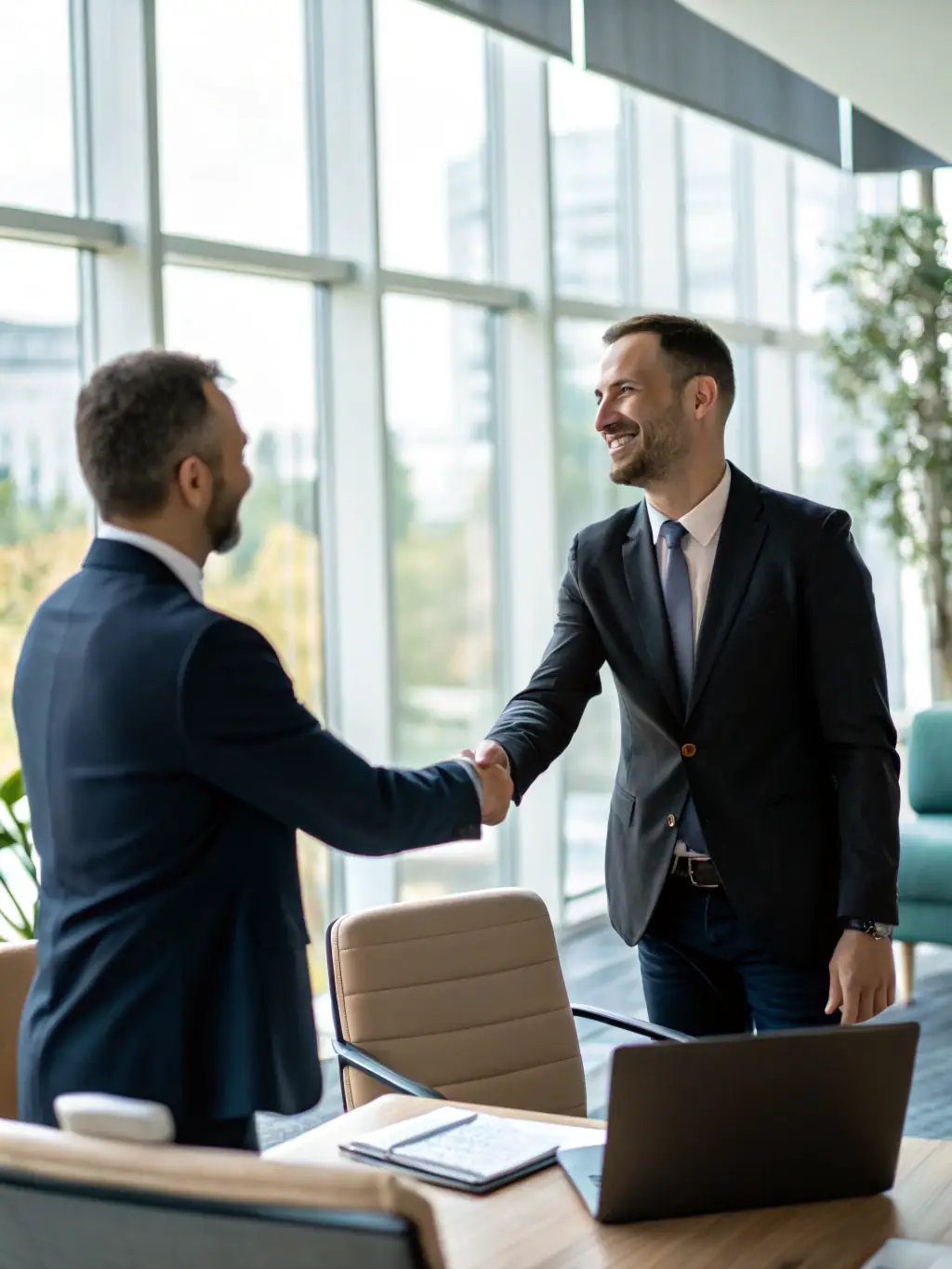 An image depicting a lawyer in a suit shaking hands with a business owner, symbolizing a successful debt recovery agreement.